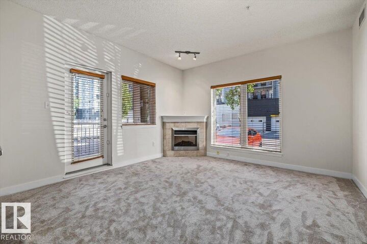 Property Photo: 10333 112 Street NW 118 AB T5K 0B4