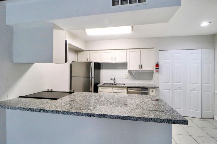 Property Photo:  5929 Queensloch Drive 127  TX 77096 