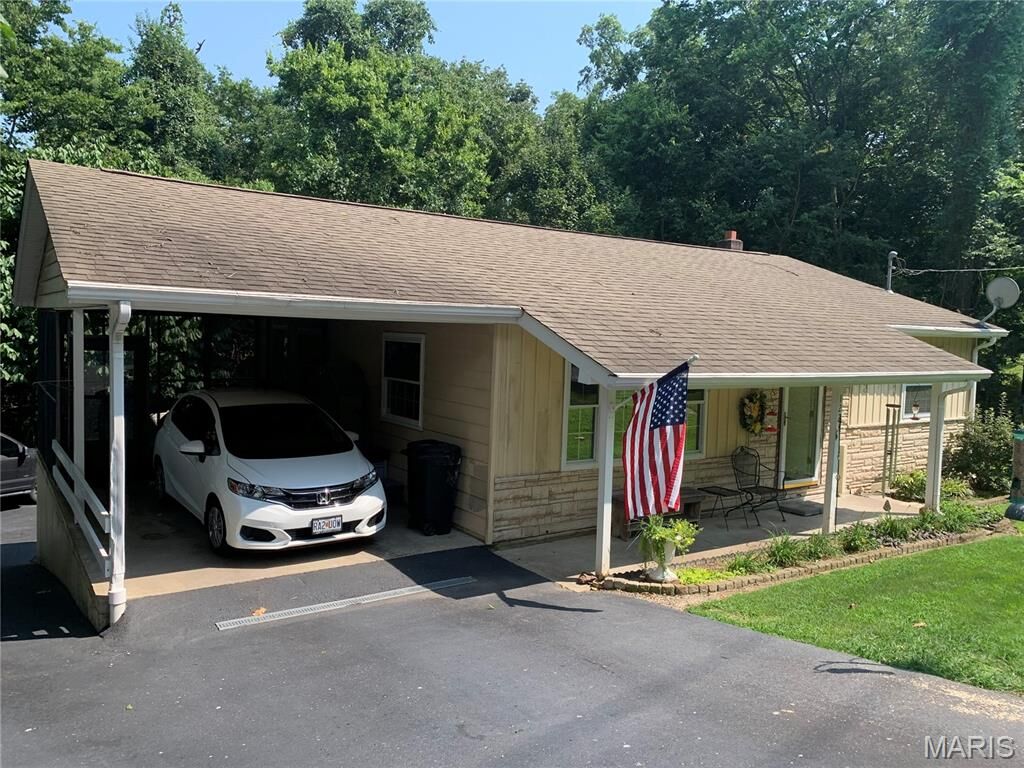Property Photo: 1223 W Cape Rock Drive MO 63701