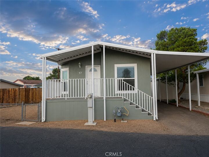Property Photo:  22601 Bear Valley Road 33  CA 92308 