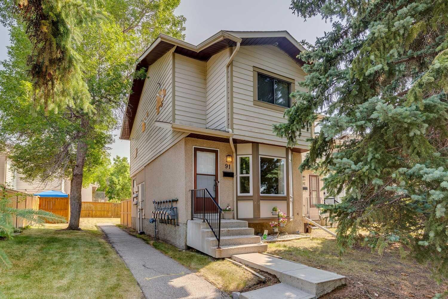 Property Photo:  91 Deerfield Drive SE  AB T2J 6T9 