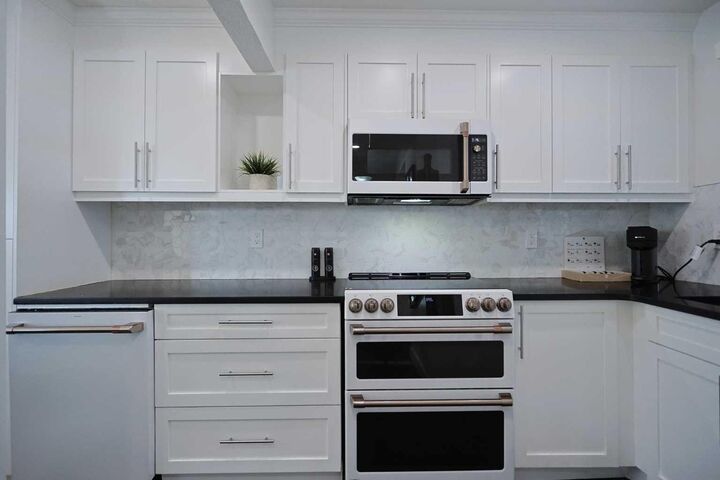 310 Falconridge Crescent NE 205 — photo 1