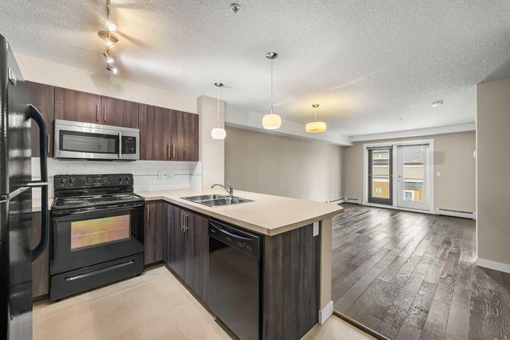 Property Photo:  2300 Evanston Square NW 212  AB T3P 0G8 