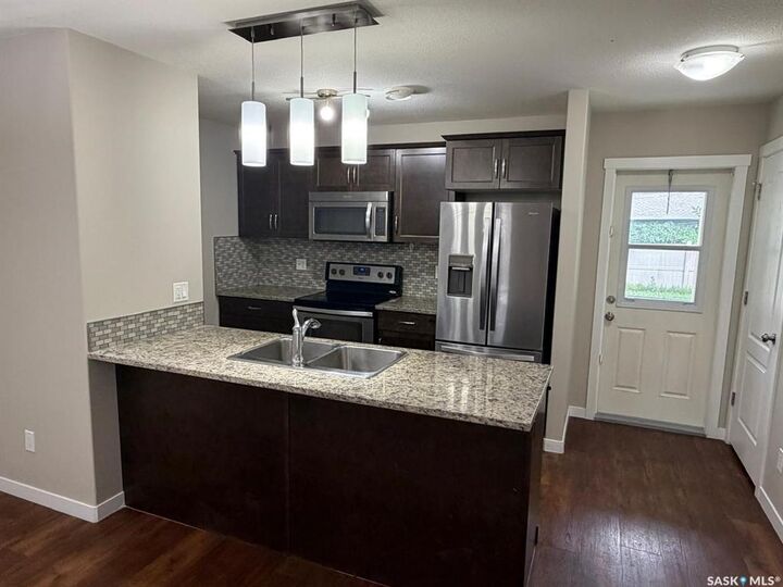 Property Photo: 3440 Avonhurst Drive 604 SK S4R 2E1