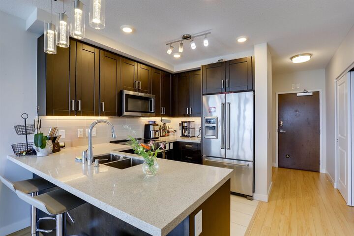 Property Photo: 11967 80 Avenue 2703 BC V4C 0E2