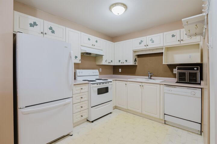Property Photo: 7554 Briskham Street 302 BC V2V 3L9