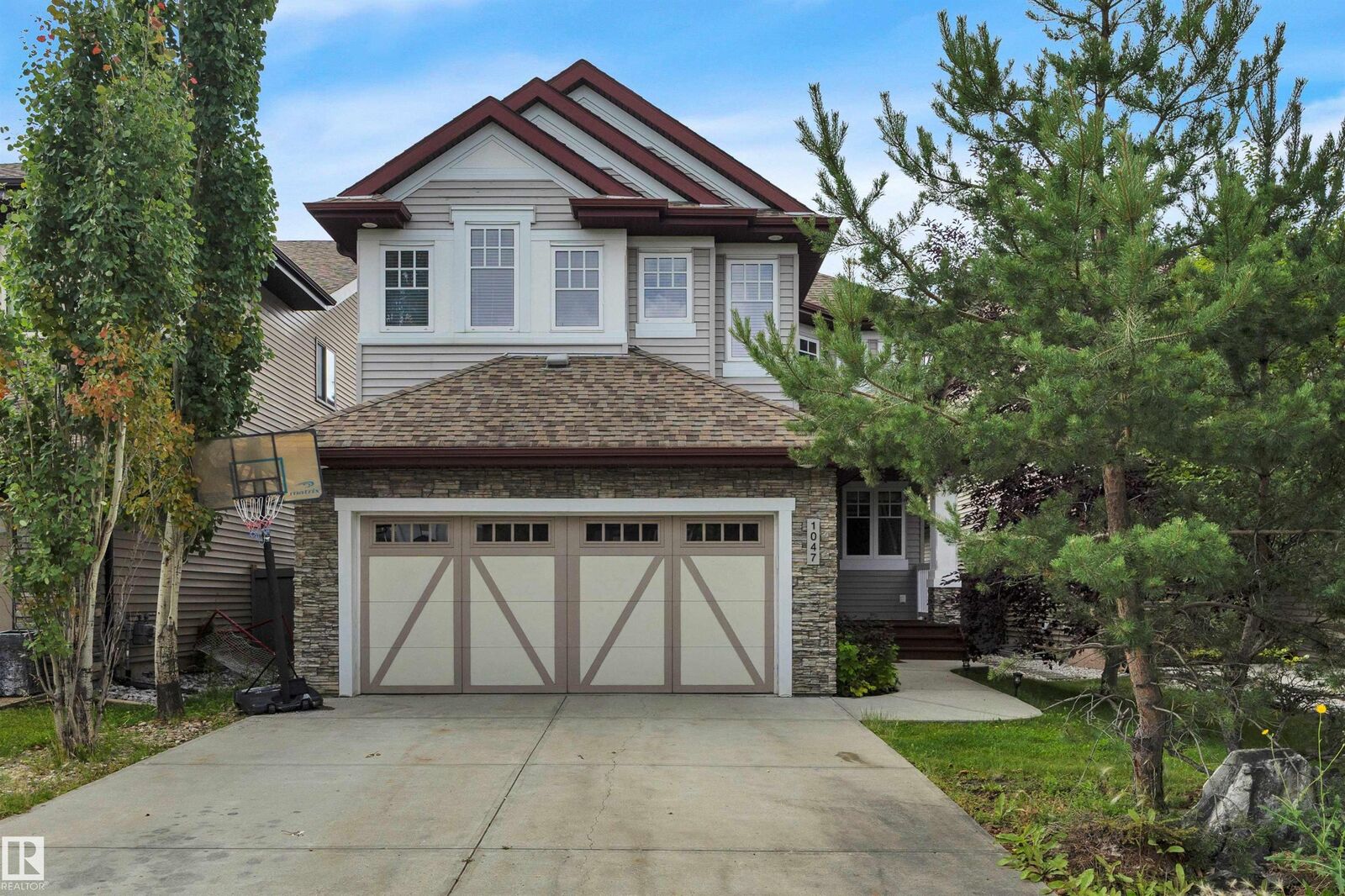 Property Photo: 1047 Armitage Crescent SW AB T6W 0K3