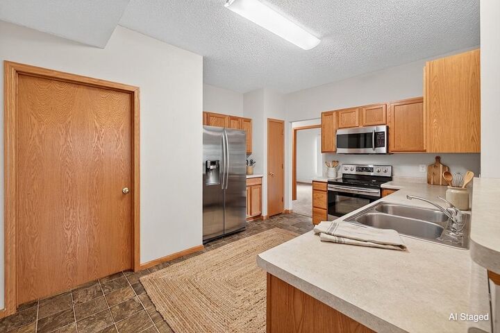 Property Photo:  7729 Elm Grove Avenue  MN 55428 