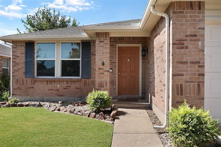 Property Photo: 1121 Batt Masterson Drive TX 75409