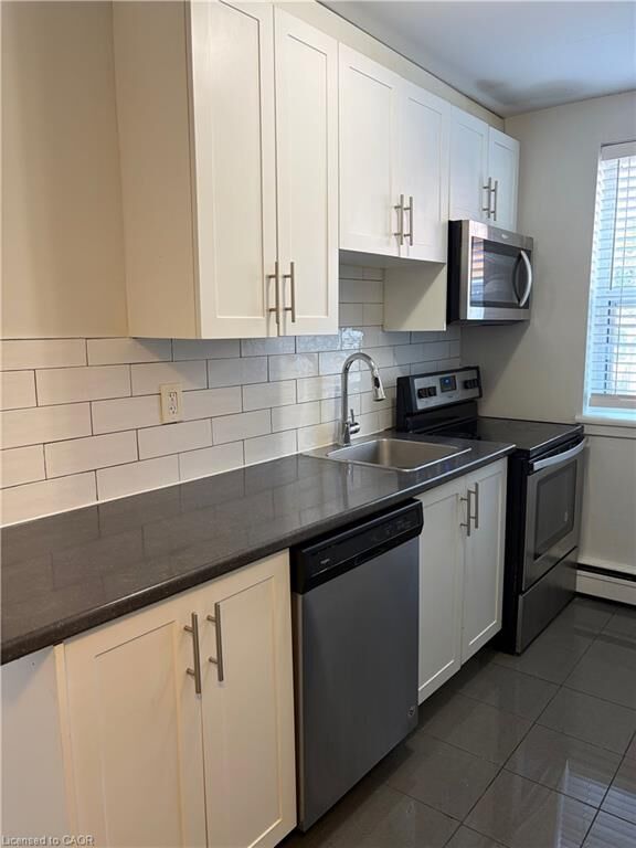 Property Photo: 2 Grant Boulevard 3 ON L9H 4N9