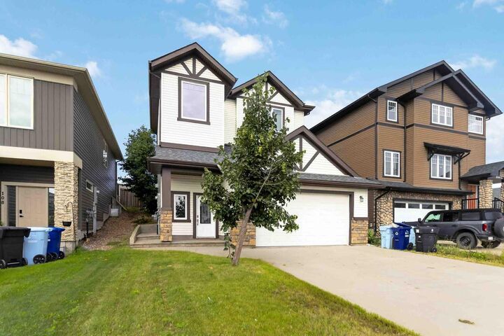 Property Photo: 104 Killdeer Way AB T9K 0P8