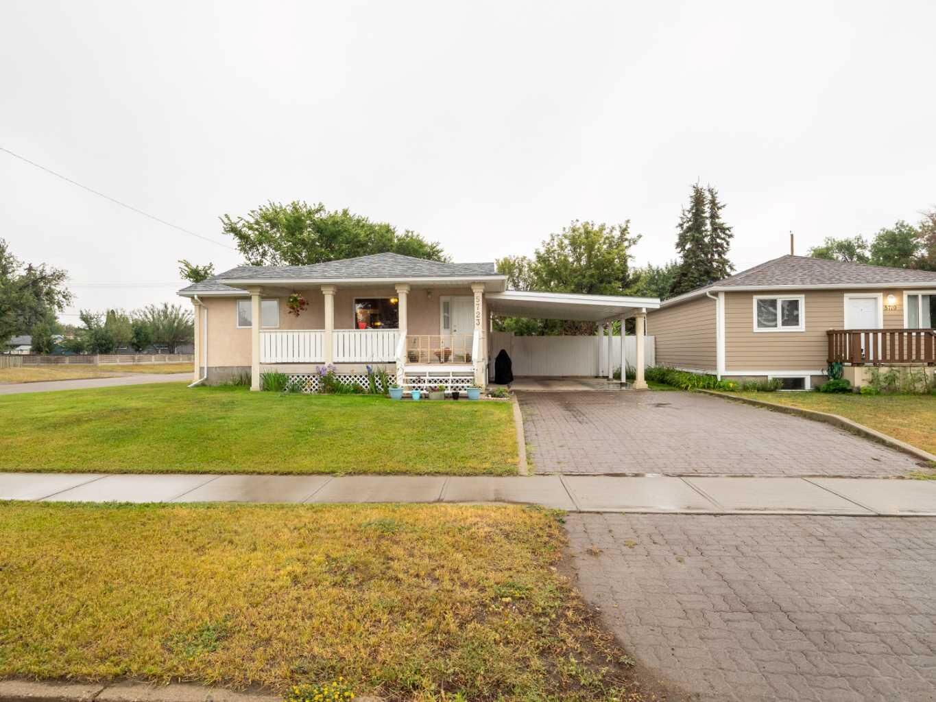 Property Photo:  5723 54 St  AB T1G 1K9 