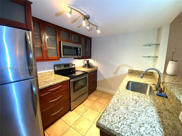 Property Photo:  4530 SW 68th Ct Cir 32-6  FL 33155 