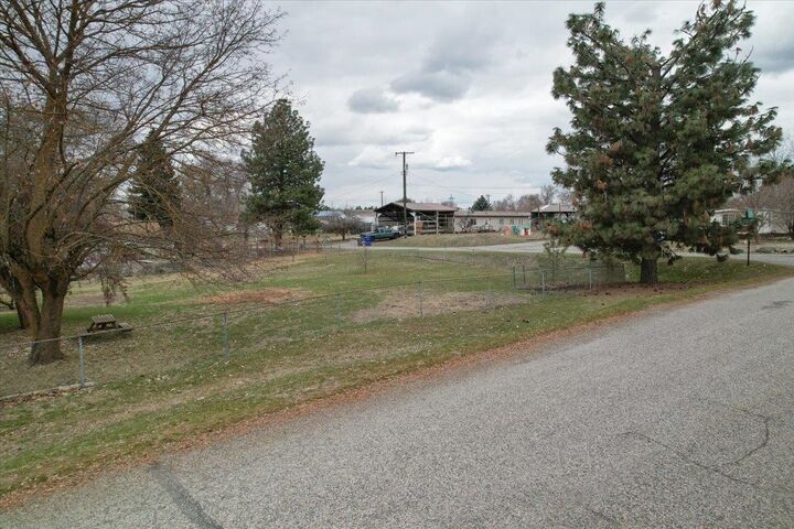 Property Photo:  117xx N Sheridan St  WA 99021 