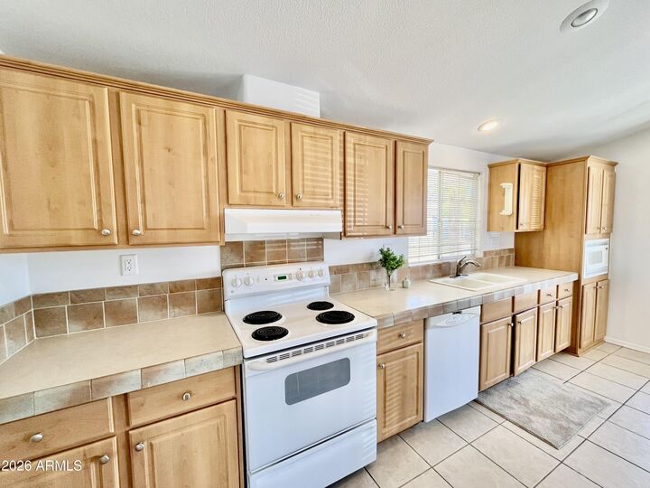 Property Photo:  10960 N 67th Avenue 94  AZ 85304 