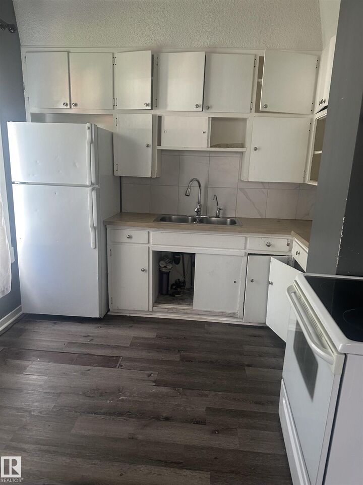 Property Photo: 11618 89 Street NW AB T5B 3V2