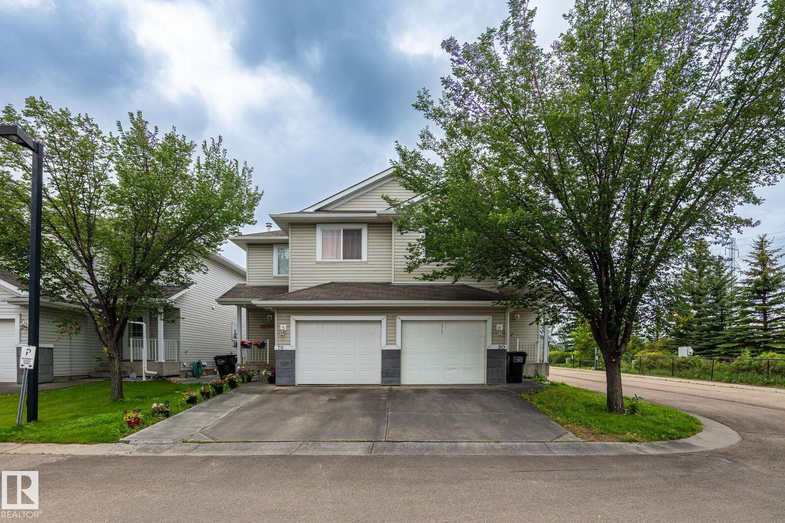 Property Photo:  #80 4350 23st NW  AB T6T 1X8 