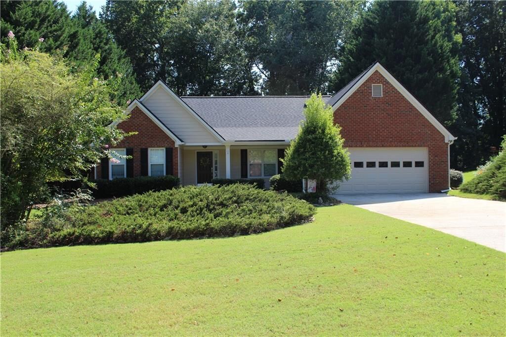 Property Photo:  7730 Timberline Ovlk  GA 30041 