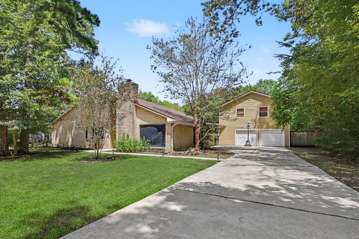 Property Photo:  2407 Fawnwood Lane  TX 77386 