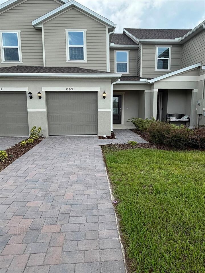 Property Photo: 16631 Luminary Loop FL 34714
