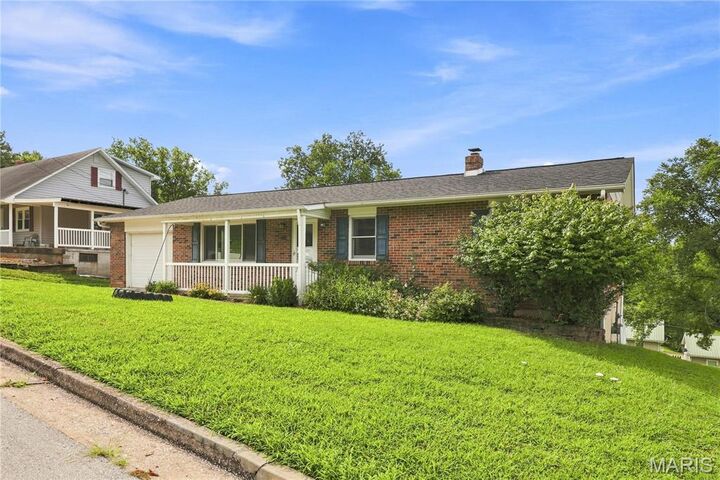 Property Photo:  210 E 12th Street  MO 65041 