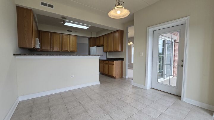 Property Photo: 101 Pointe Drive 302 IL 60062