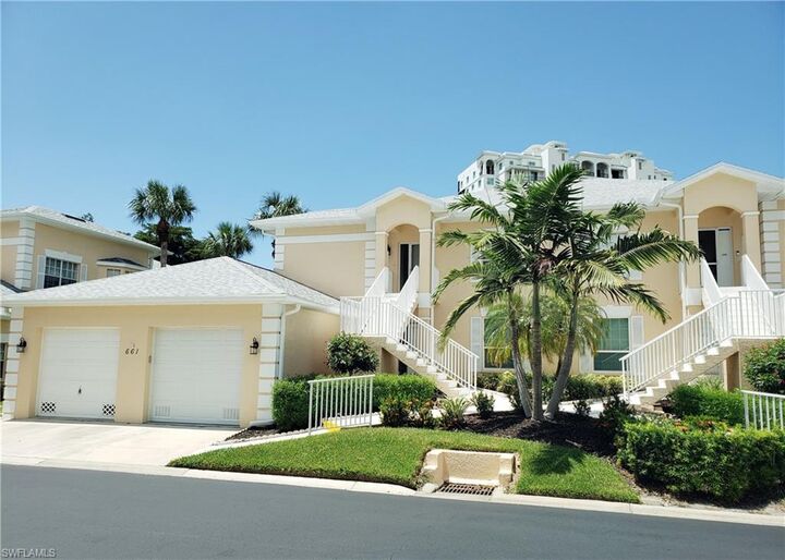 Property Photo:  661 Wiggins Lake Dr 201  FL 34110 