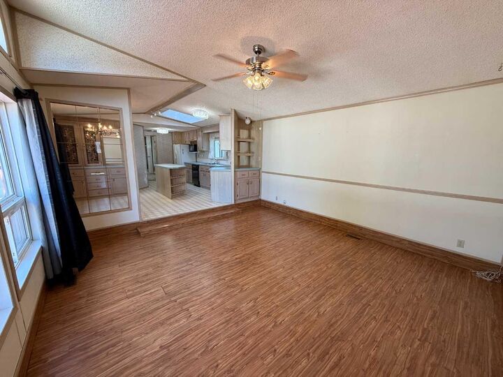 Property Photo: 700 Carmichael Lane 402 AB T7V 1S9
