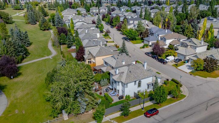 Property Photo: 142 Springbank Crescent SW AB T3H 3S6