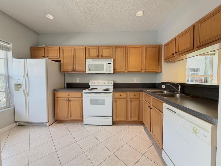 Property Photo:  5035 Palmbrooke Circle  FL 33417 