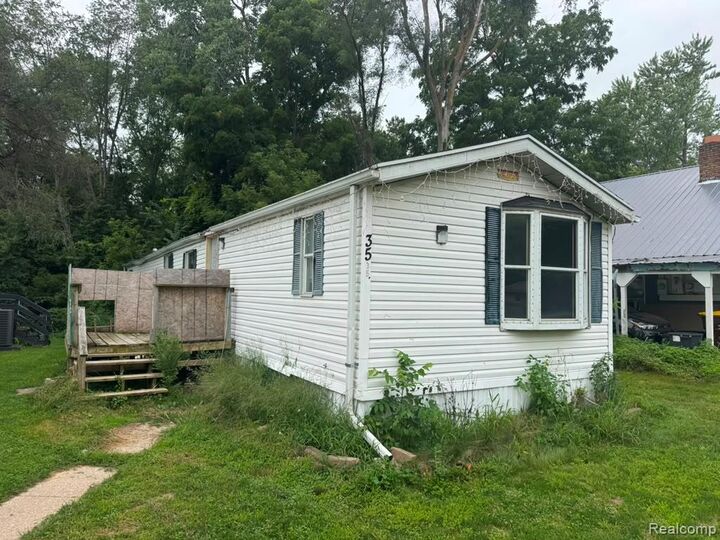 Property Photo: 926 Hill St Lot #35 MI 48875