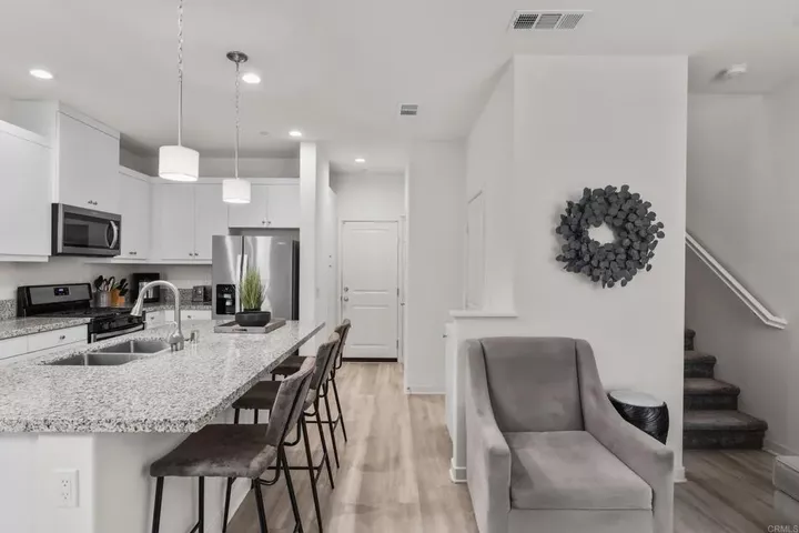 Property Photo:  4136 Sitio Flor  CA 92057 