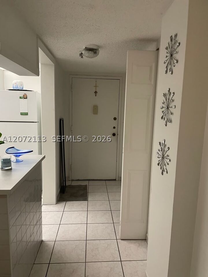 Property Photo:  250 181st Dr 111  FL 33160 