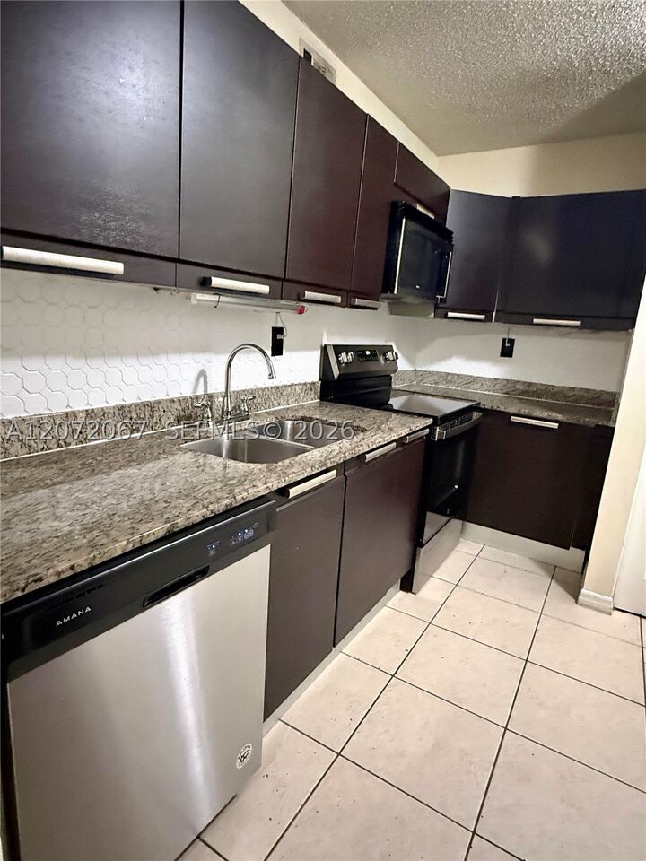 Property Photo: 11225 Royal Palm Blvd 11225 FL 33065