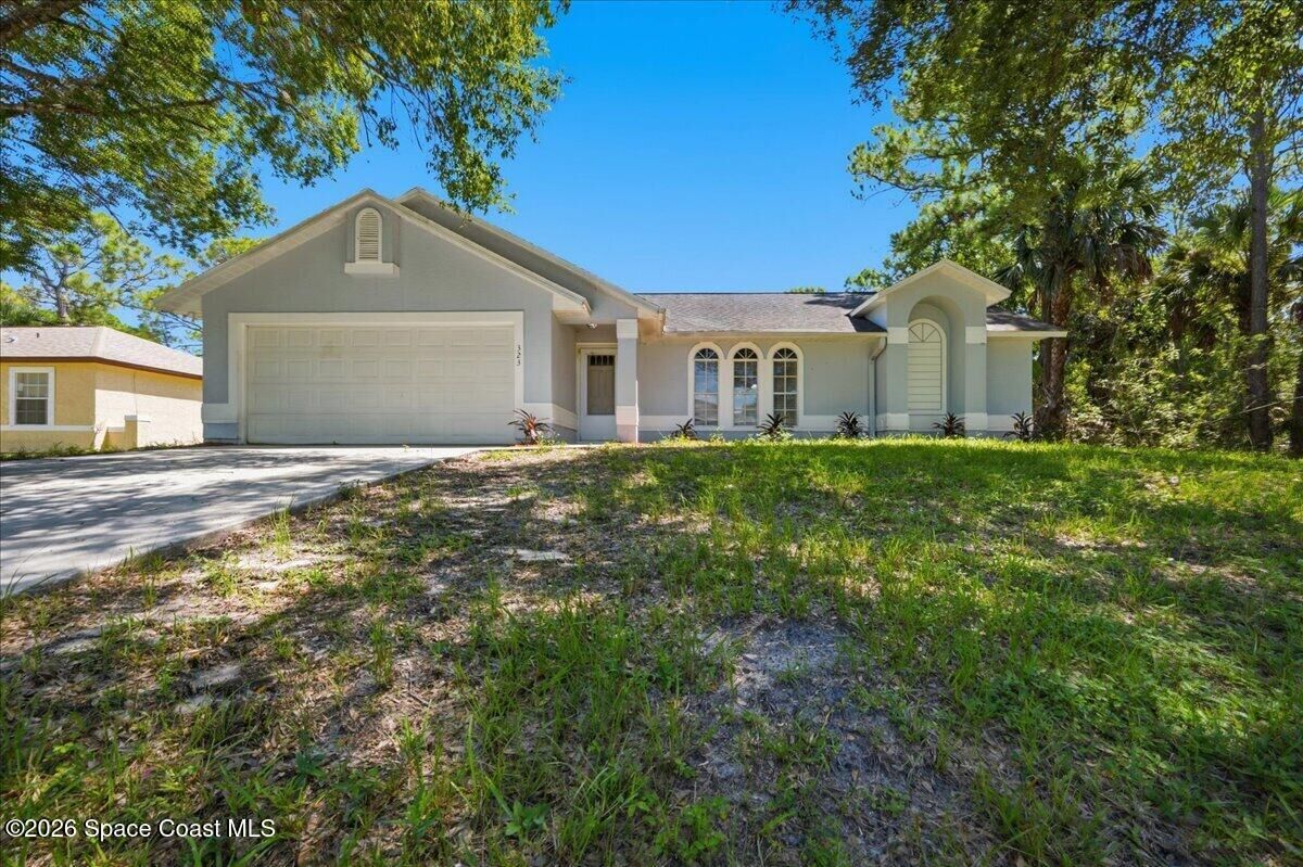 Property Photo:  323 San Remo Road SW  FL 32908 