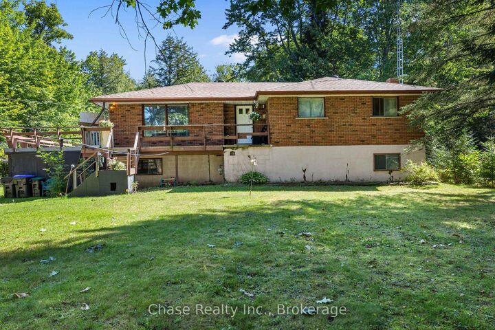 655 Tiny Beaches Road N — photo 1
