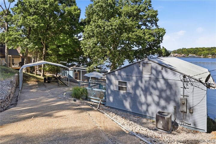 Property Photo:  67 Breezy Point Drive  MO 65020 