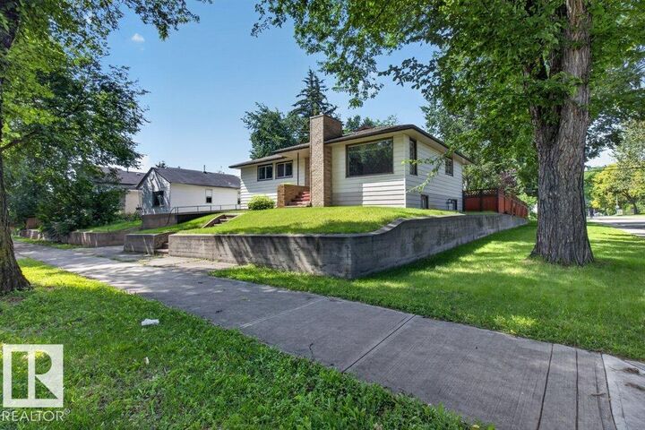 Property Photo:  11852 55 Street NW  AB T5W 3P8 