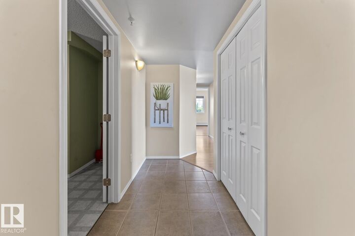 Property Photo:  1705 7 Avenue 201  AB T9M 0A6 