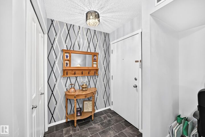 Property Photo:  5390 Chappelle Road SW 401  AB T6W 3K7 