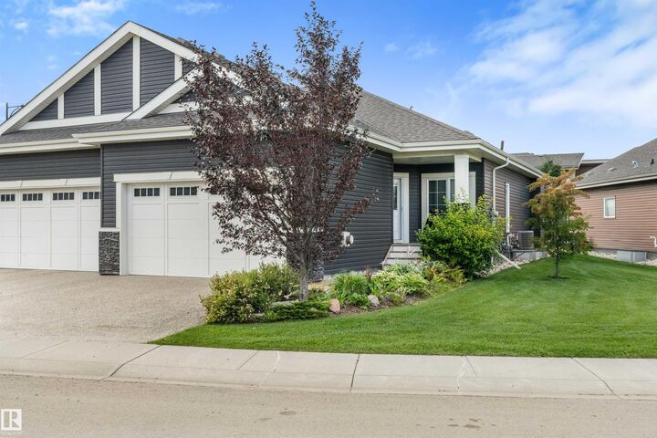 Property Photo: 50 Heatherglen Drive 214 AB T7X 0R6