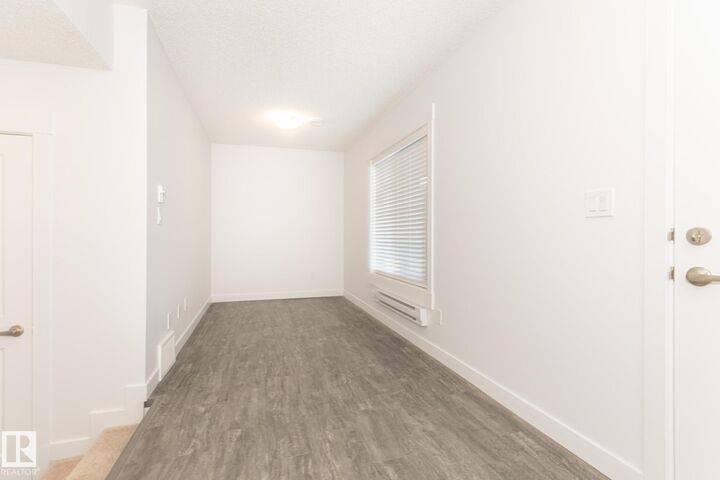 Property Photo:  3607 James Mowatt Trail SW  AB T6W 3W5 