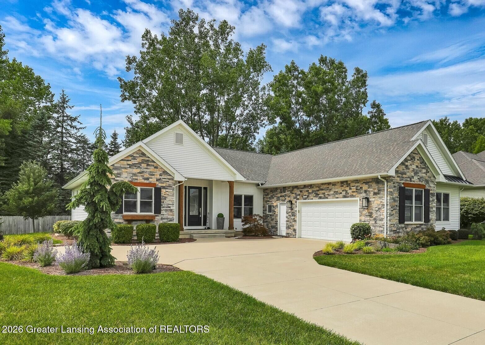 Property Photo:  822 Laurelwood Drive  MI 48917 