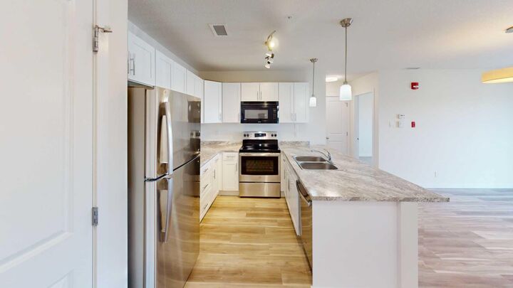 Property Photo: 10101 101 Avenue 202 AB T8V 0Y4