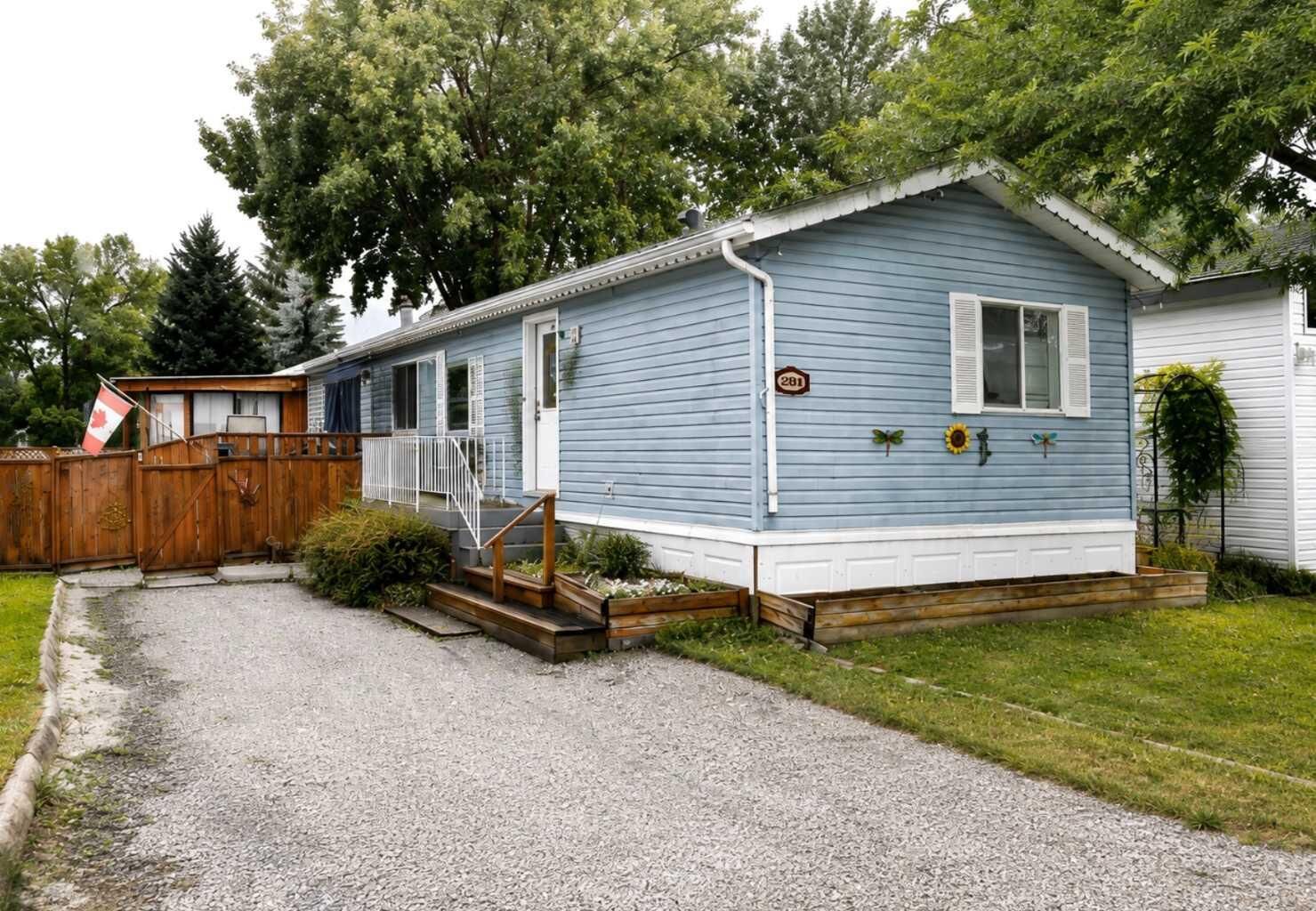 Property Photo:  209 Yardmaster Avenue  AB T1M 1P5 