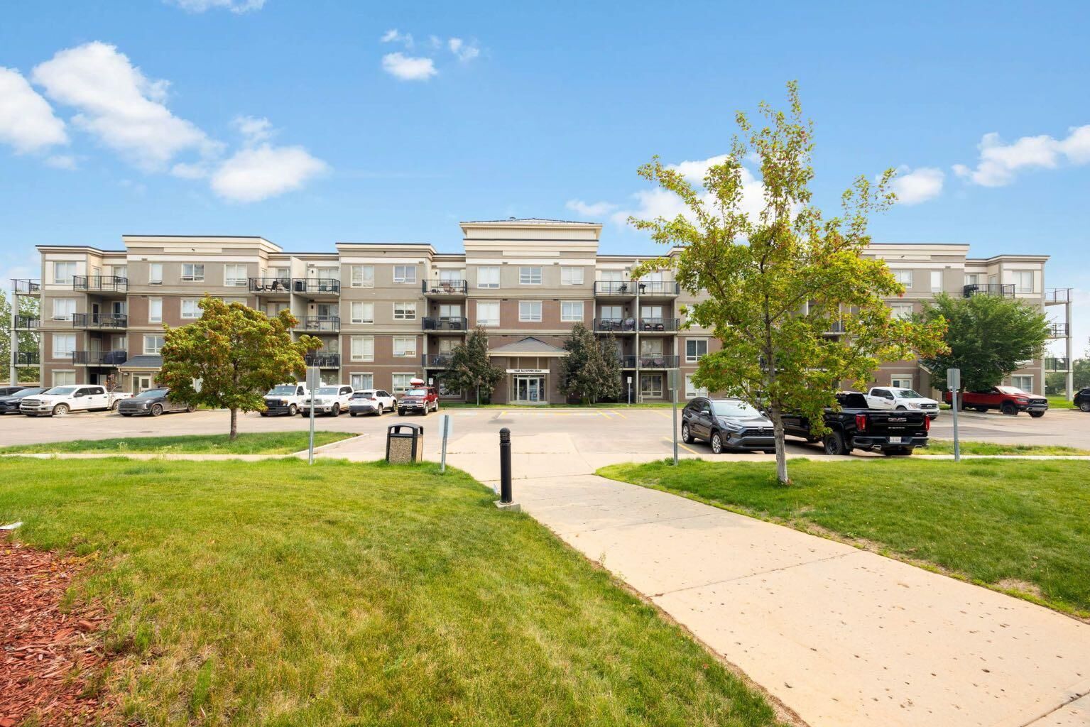 Property Photo: 136B Sandpiper Road 409 AB T9K 0J7