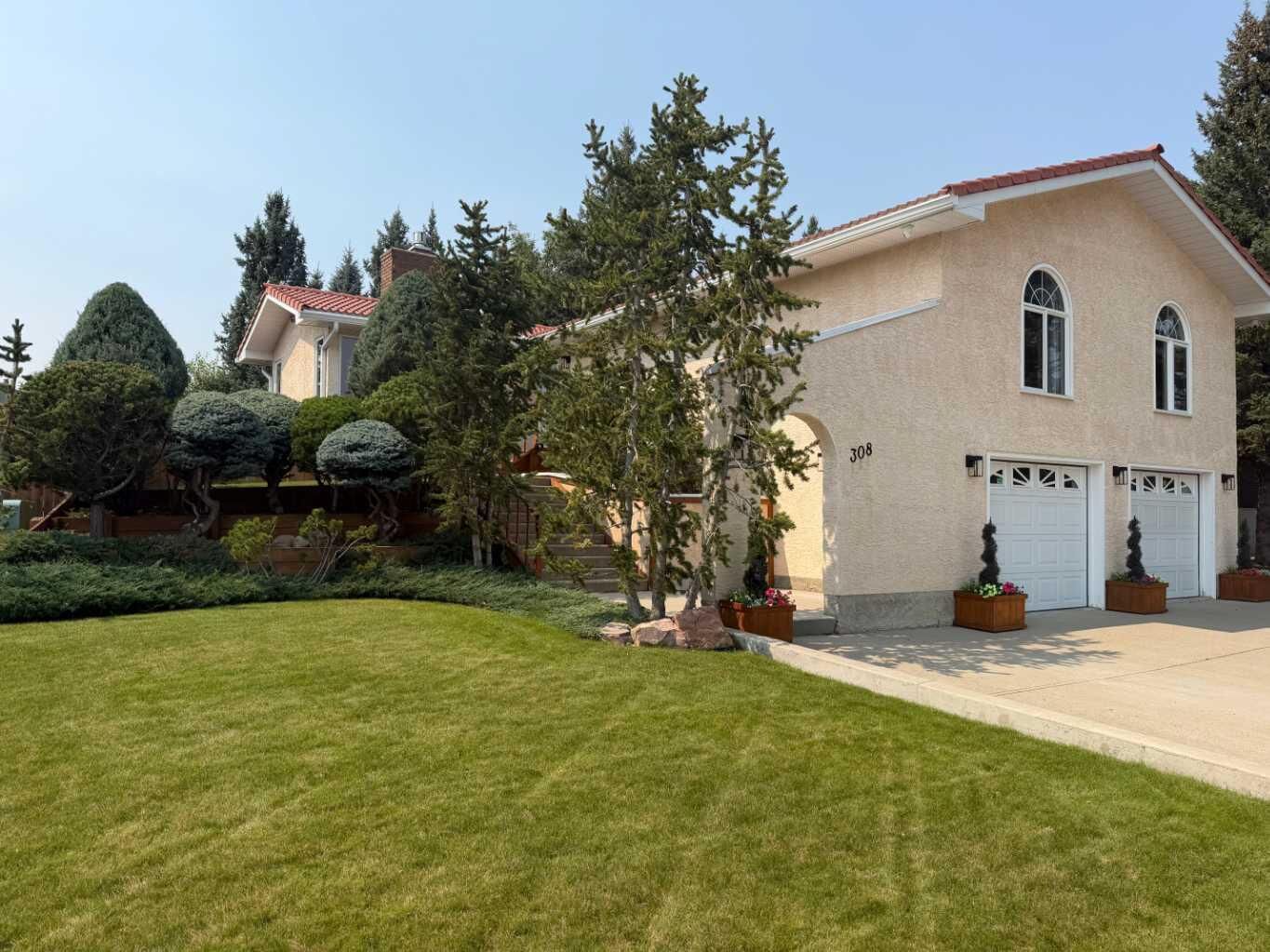 Property Photo: 308 Canniff Place SW AB T2W 2L9