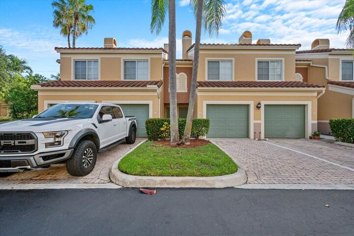 Property Photo:  11771 St Andrews Place 103  FL 33414 