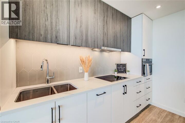Property Photo: 741 King Street West 1212 ON N2G 0E9