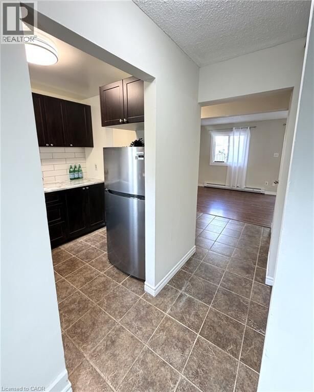 Property Photo: 397 Stirling Avenue South 3 ON N2M 3H7